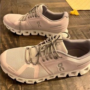 On cloud shoes , light purple / white